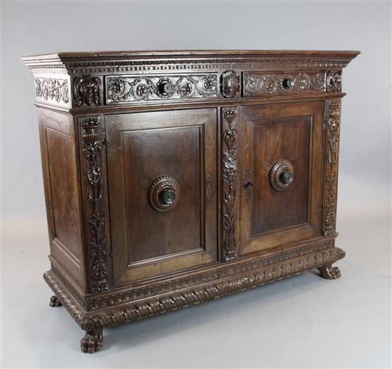 A 17th century Italian walnut credenza, W.5ft 1.5in. H.4ft 5in. D.5ft
